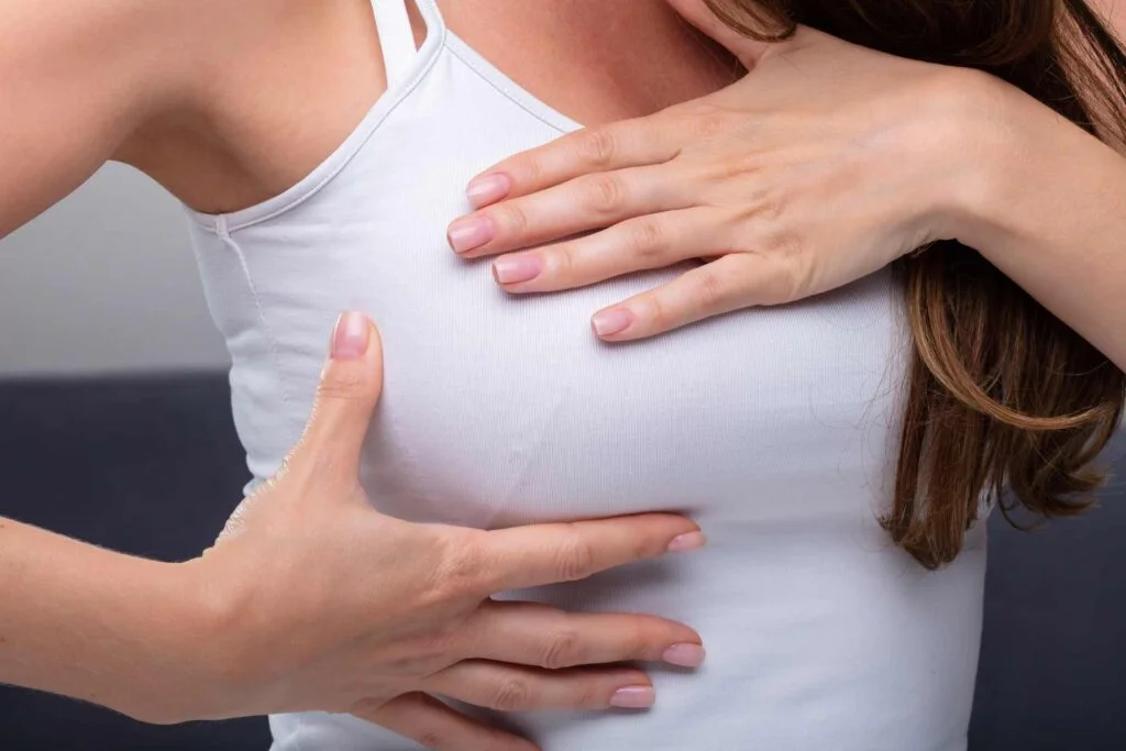 Closeup Of Woman With Hands Feeling Pain In Breast 1 4X683